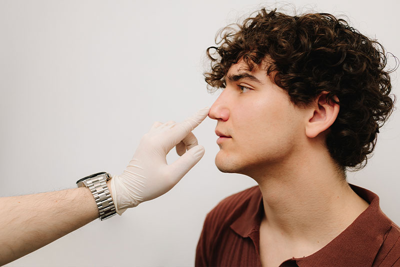 male patient being examined by doctor for sinus lift procedure